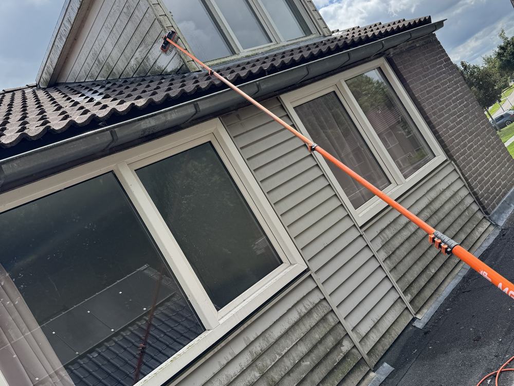 Glasbewassing met een telescoopsysteem